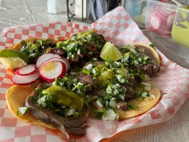 Street tacos with salsa verde and radish