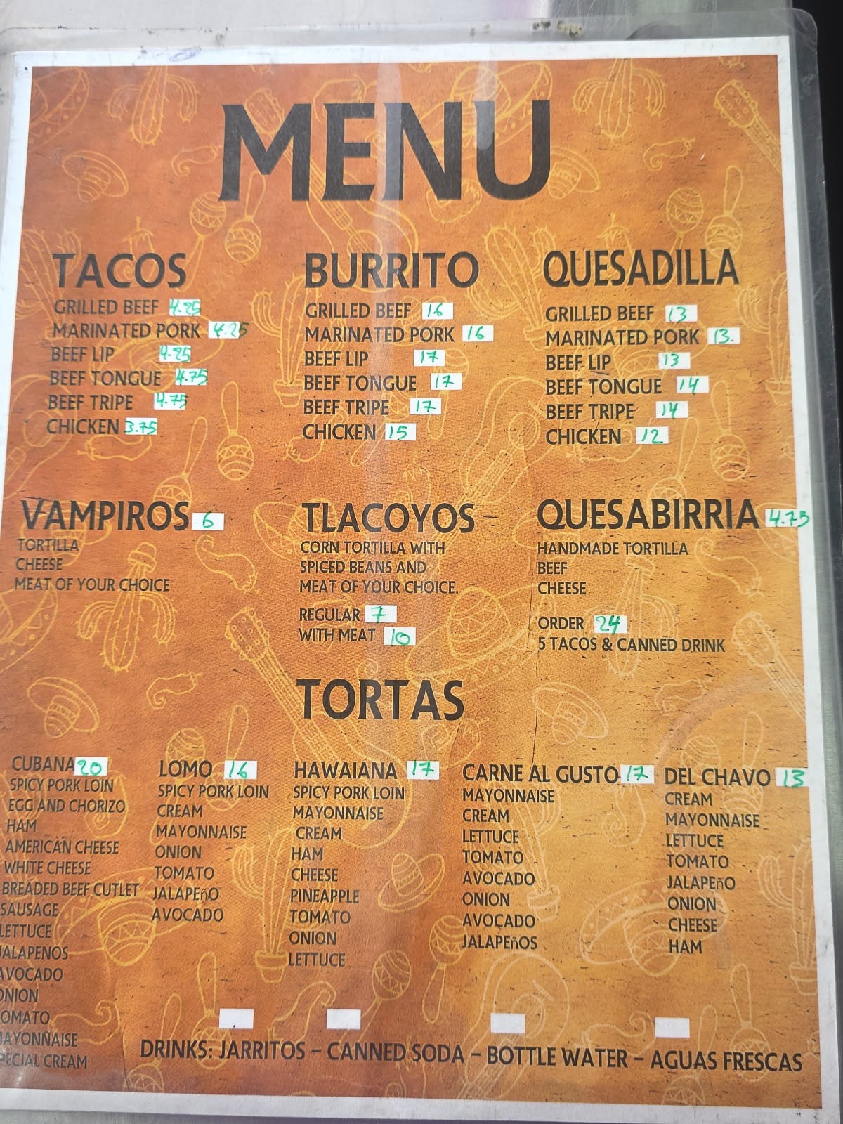The printed Tacos Ya Merito menu board at the truck, listing tacos, burritos, quesadillas, tortas and specialties with prices